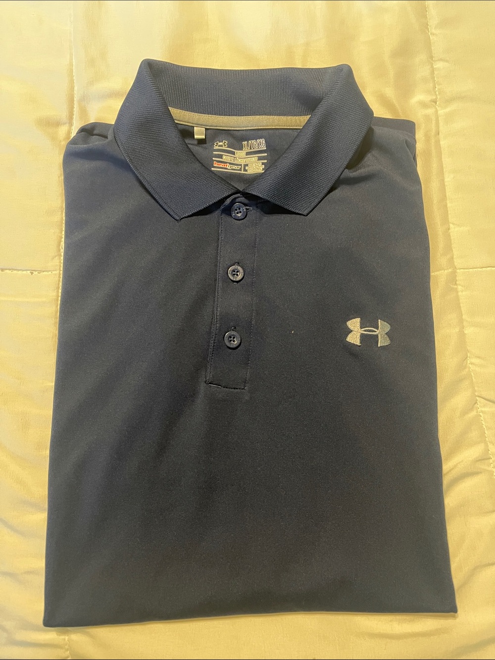 Under Armour Navy Polo Shirt with Silver Logo